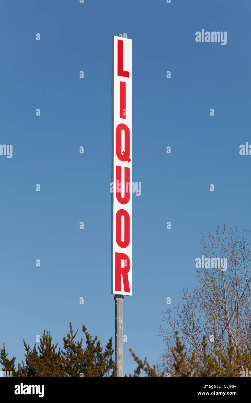 Liquor Store Sign in Red Letters Stock Photo