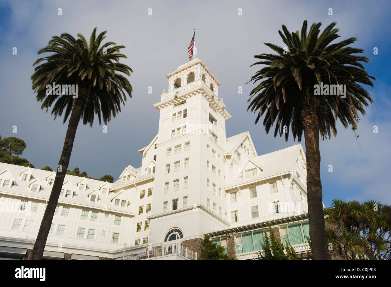 Claremont Hotel and Resort, Historic Hotel at dusk with Palm Trees