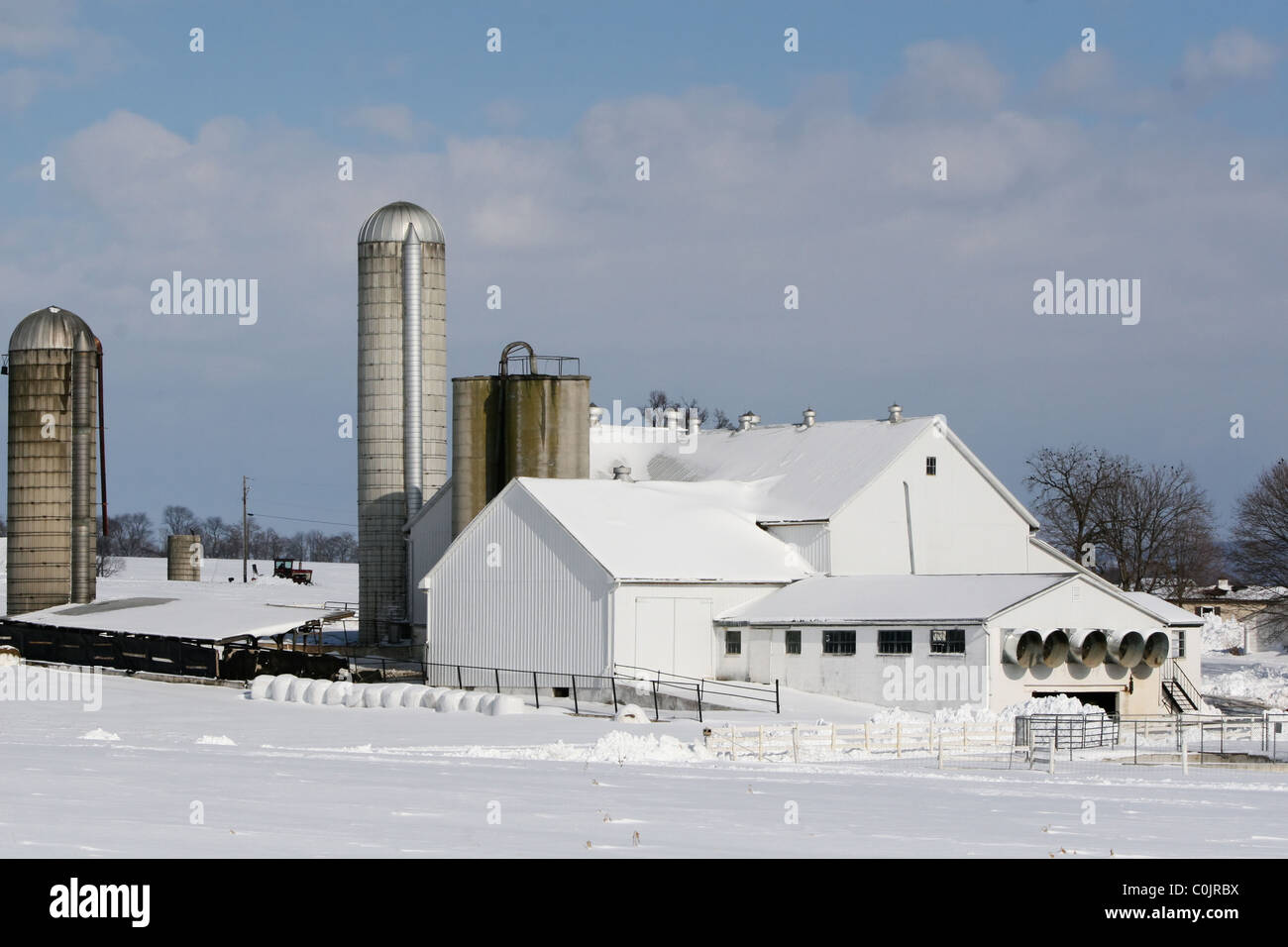 Amish farm and house under snow in Lancaster, PA Stock Photo