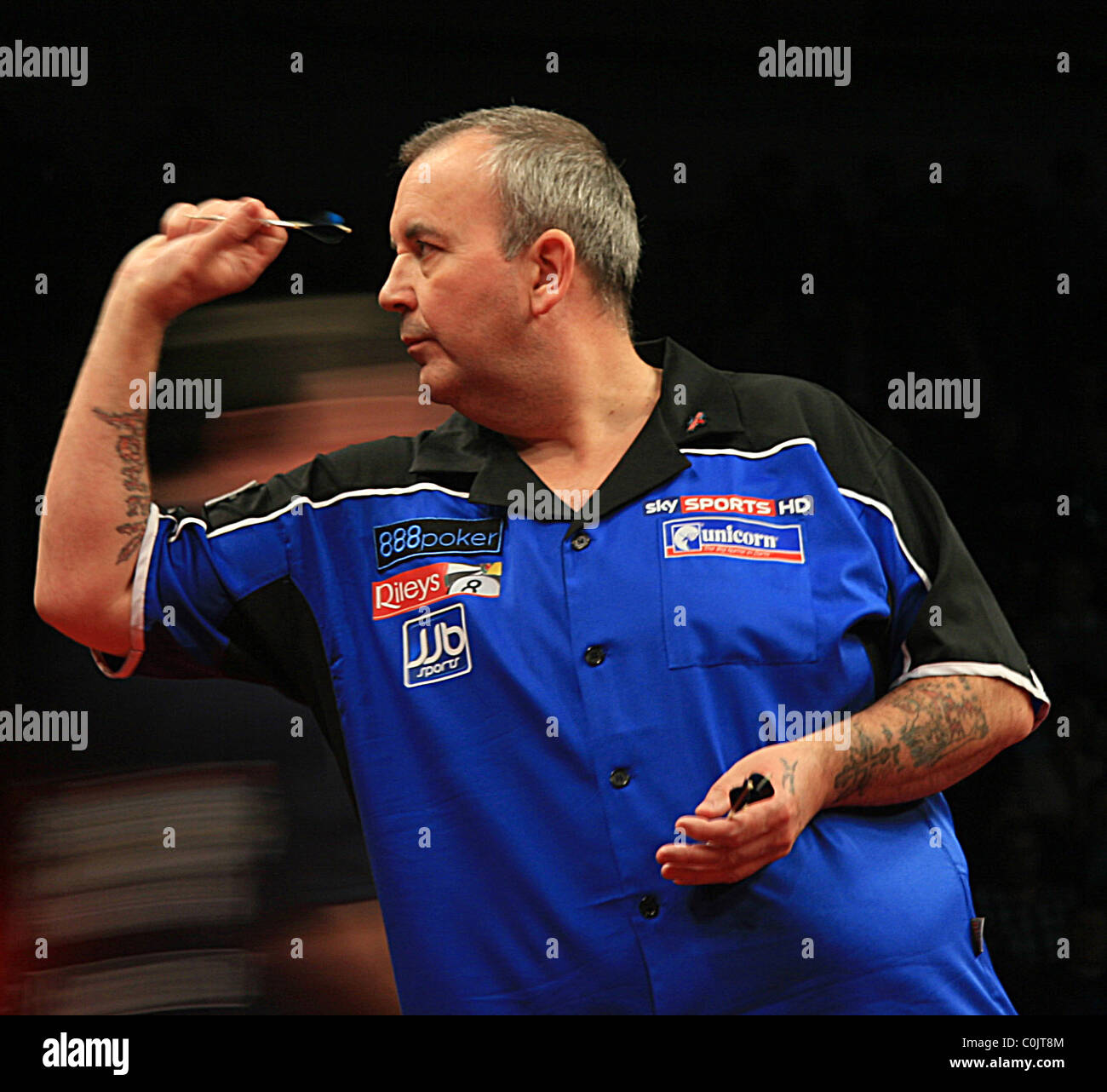 Phil 'The Power' Taylor in action against Terry Jenkins at the PDC Darts  Premier League from the Odyssey Arena in Belfast Stock Photo - Alamy