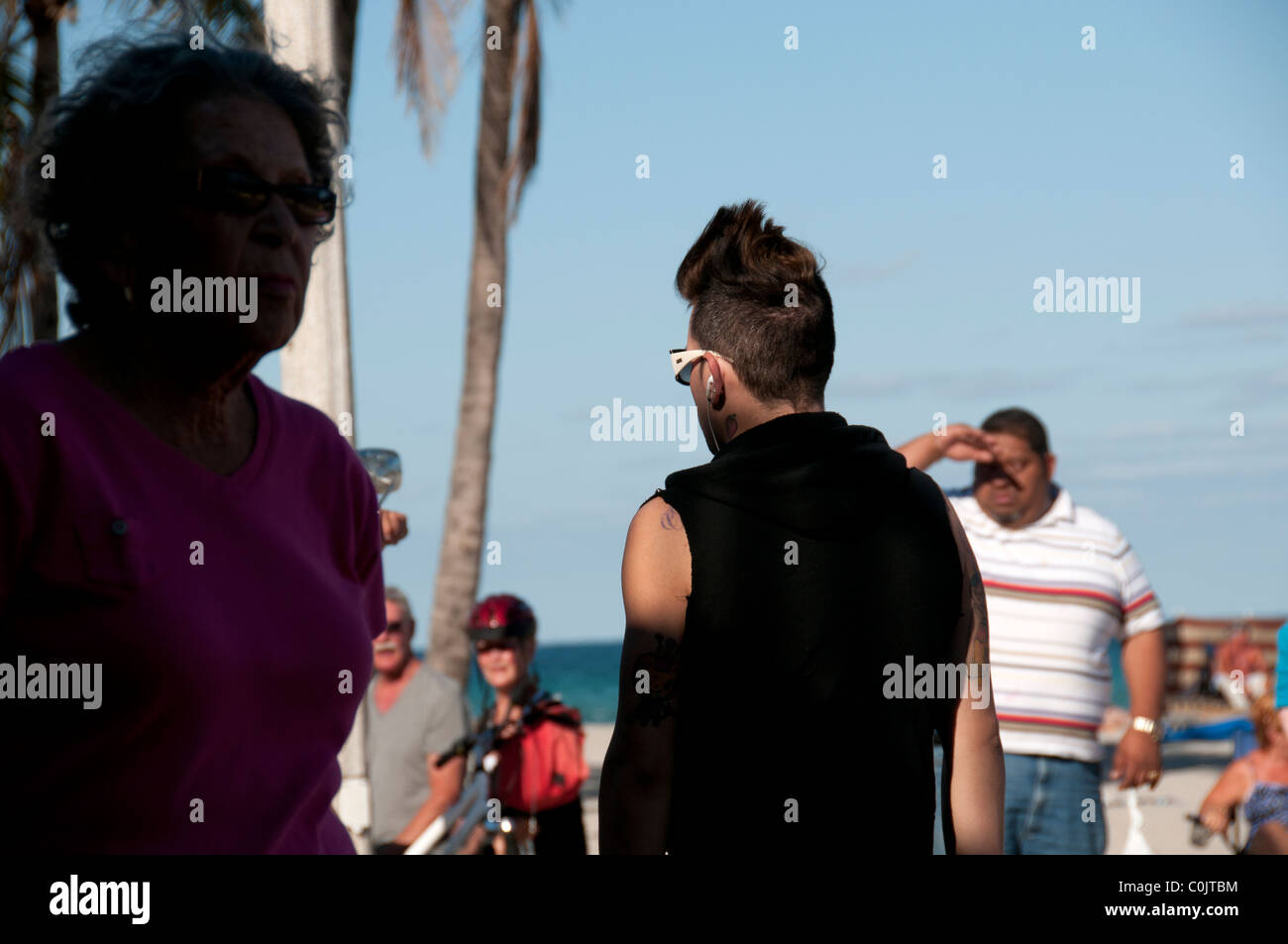 Man with strange hairstyle on Florida Beach. Stock Photo