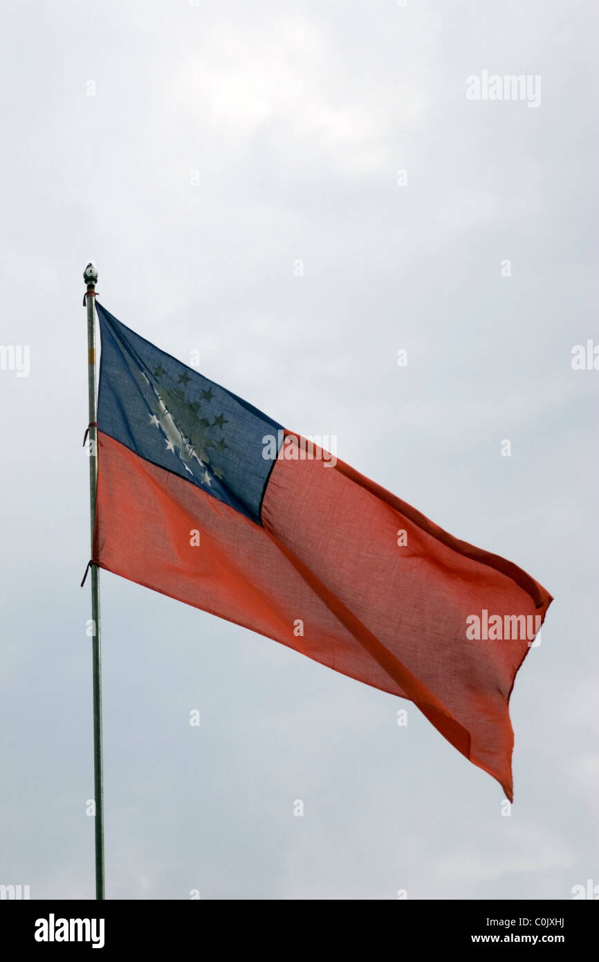 Threadbare Flag A threadbare flag of Burma (Myanmar) is flying under cloudy skies in ...
