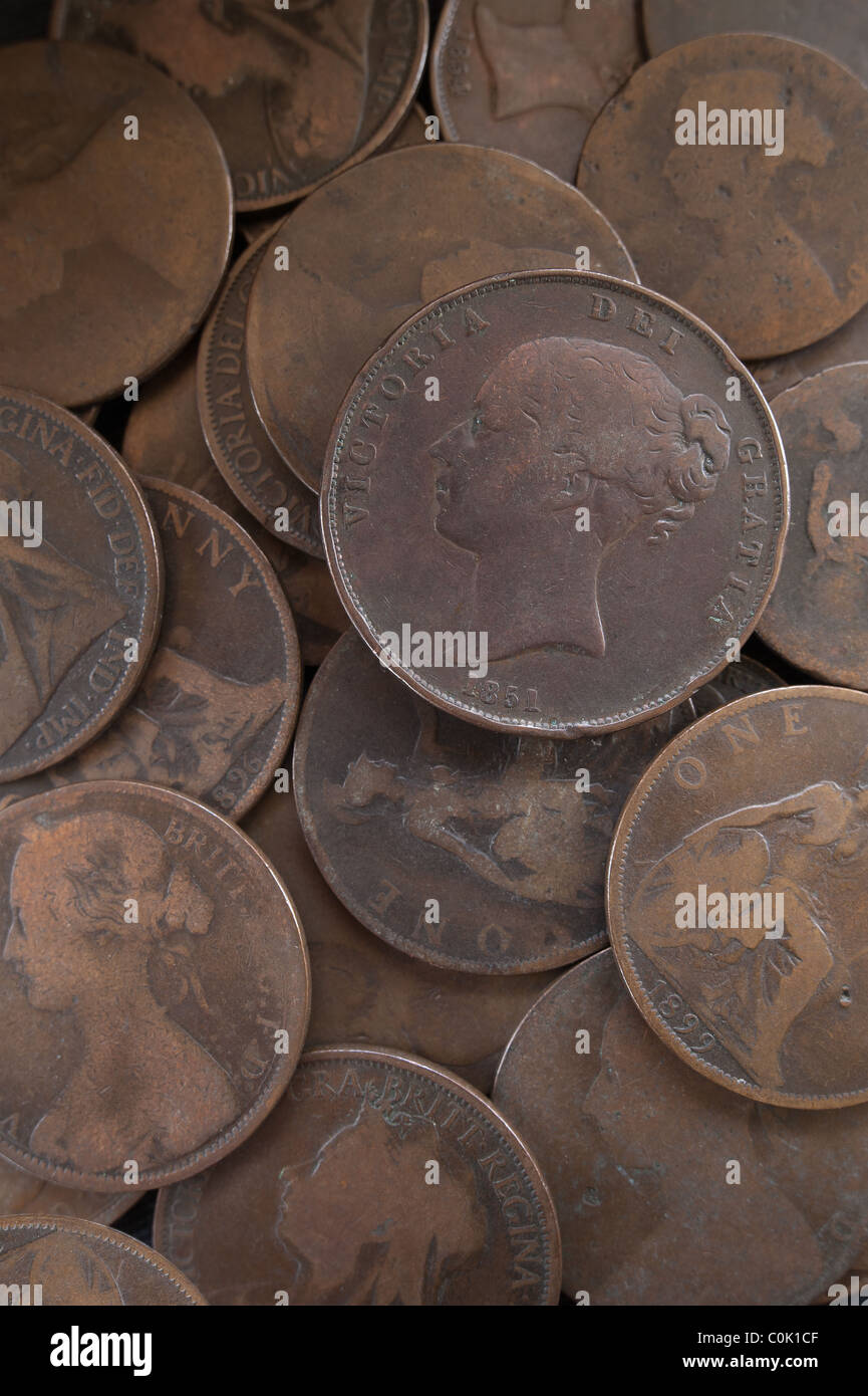 old currency uk penny 1d with King V and Queen Victoria Stock