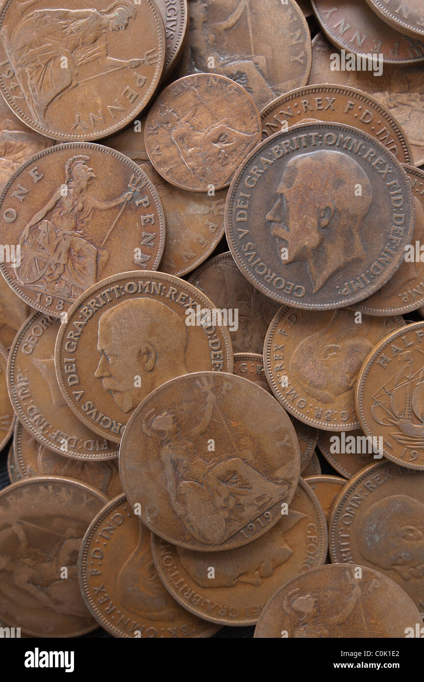 old currency uk penny 1d with King V and Queen Victoria Stock