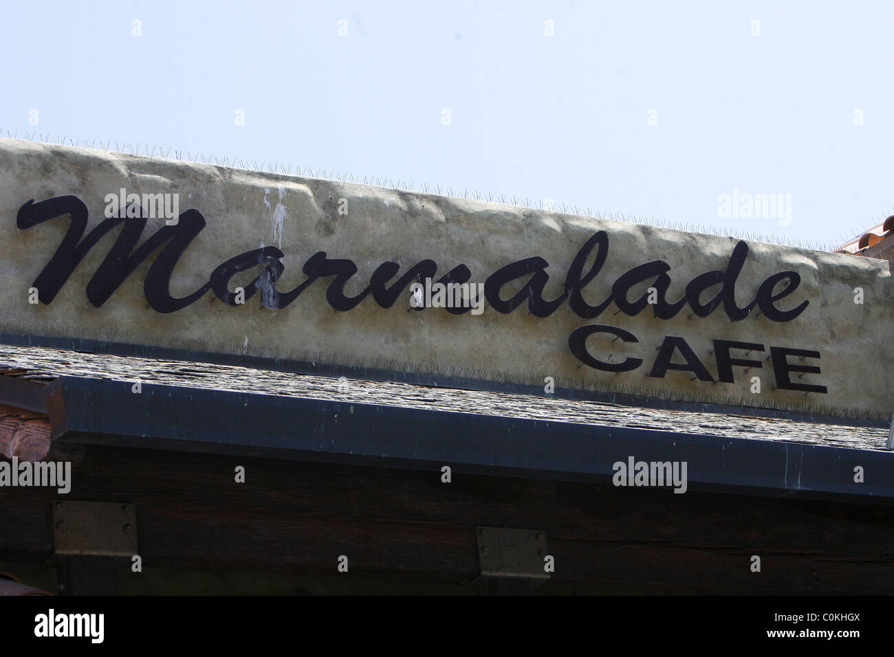 Arnold Schwarzenegger appears to query the bill as he eats at the