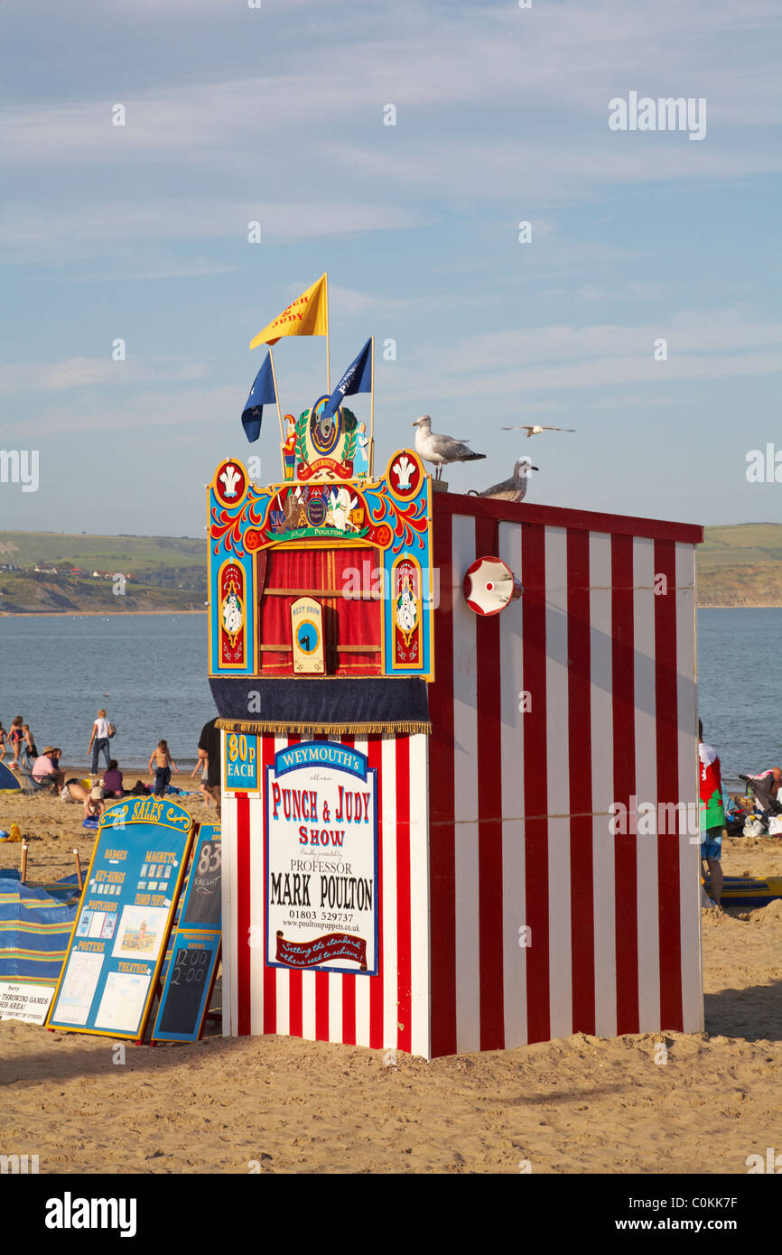Punch and Judy Show kiosk on the beach at Weymouth in August Stock Photo