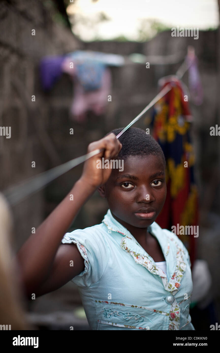 Young girl in a slum of Dar es Salaam, Tanzania, East Africa. Stock Photo