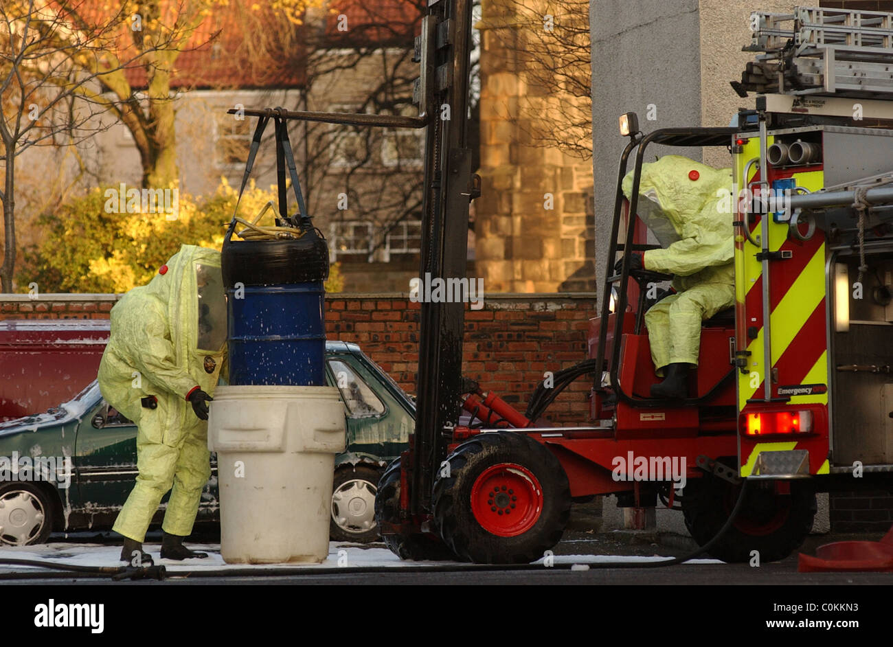 Firefighters training for a chemical spill in full chemical spill with