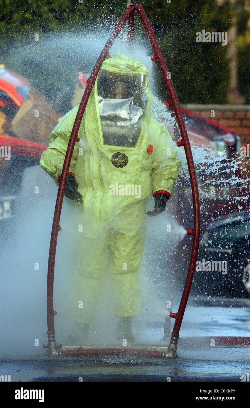 Firefighters training for a chemical spill in full chemical spill with
