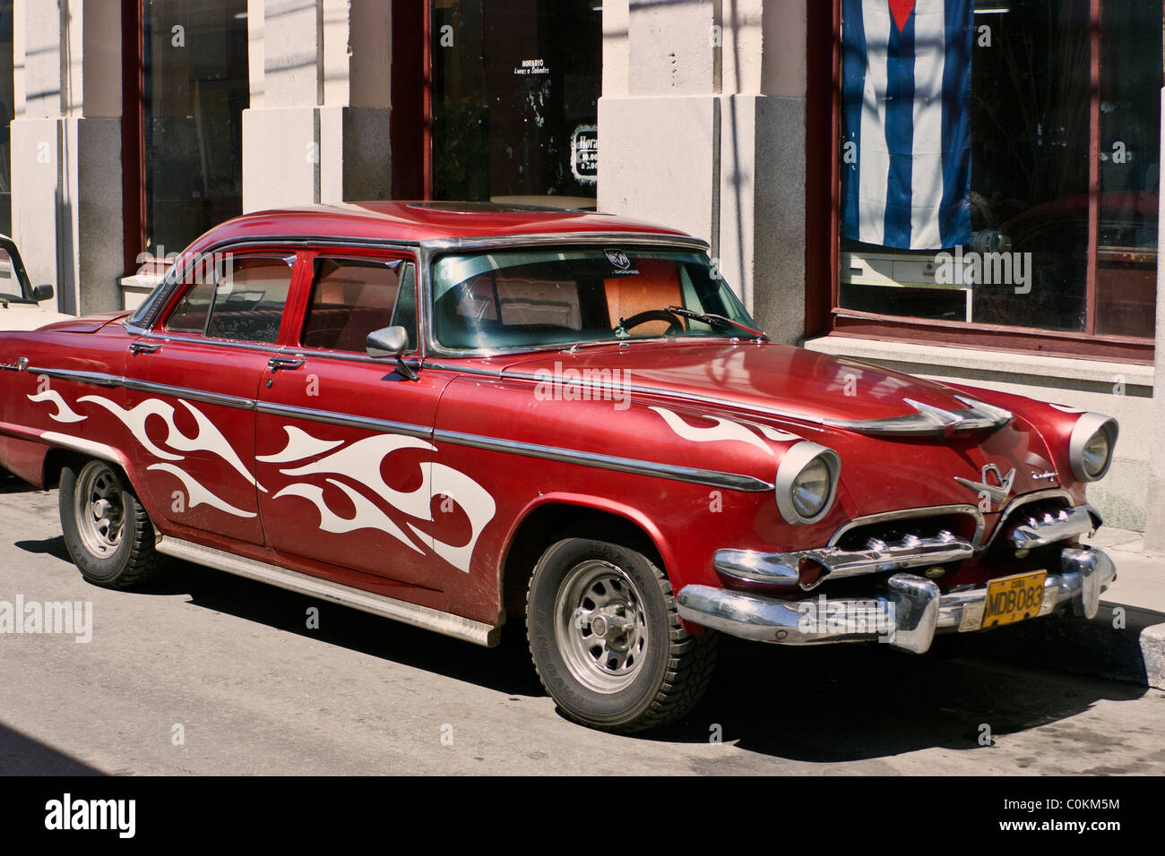 What makes Cuba famous? Beutifully restored American cars Stock Photo