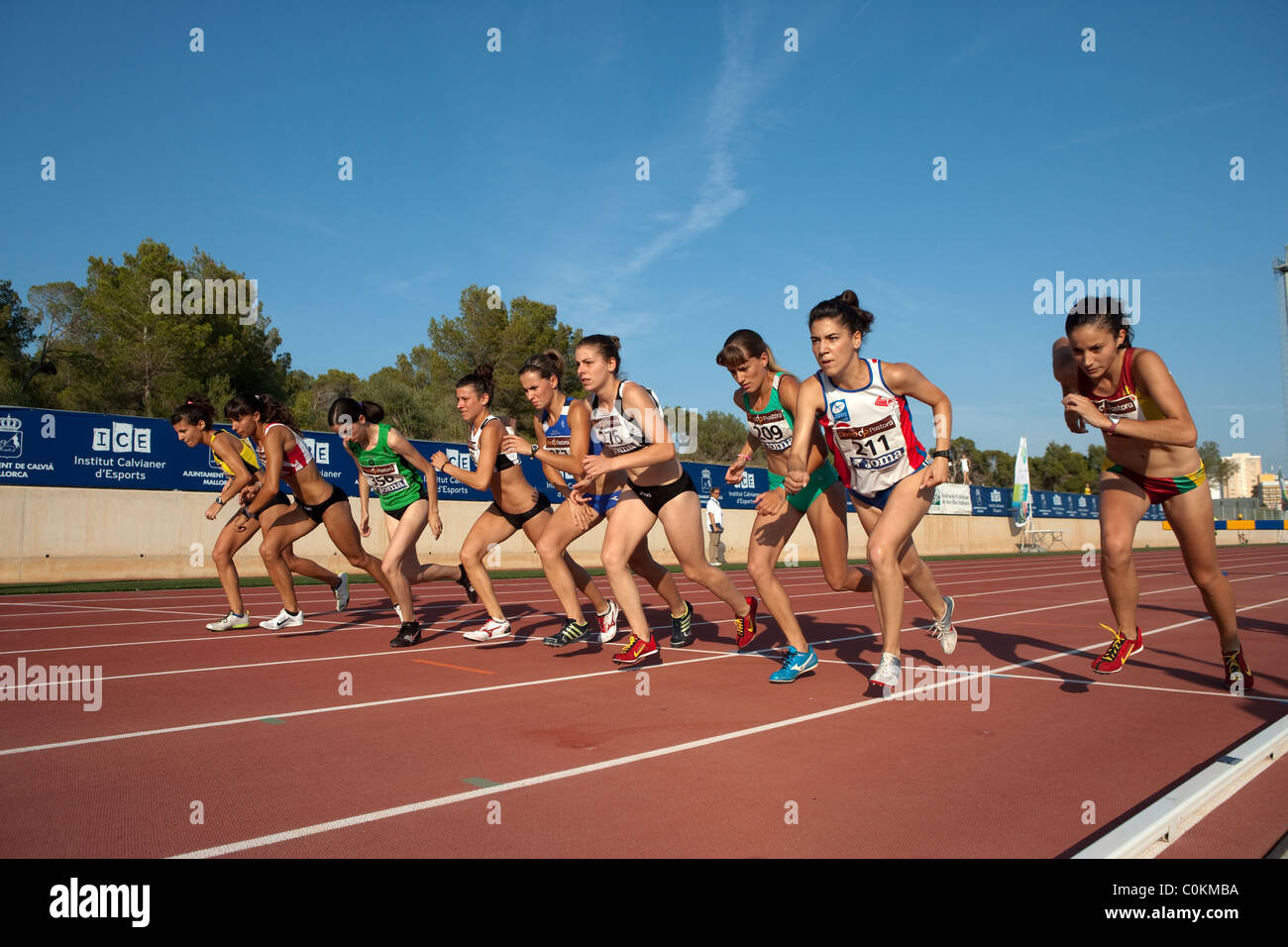 Racers adult athlete Sport outdoor Athletics competition race track ...