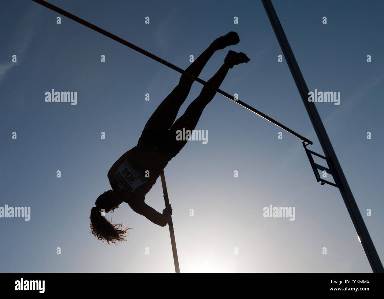 pole vault athlete woman jumping Sport outdoor Athletics competition