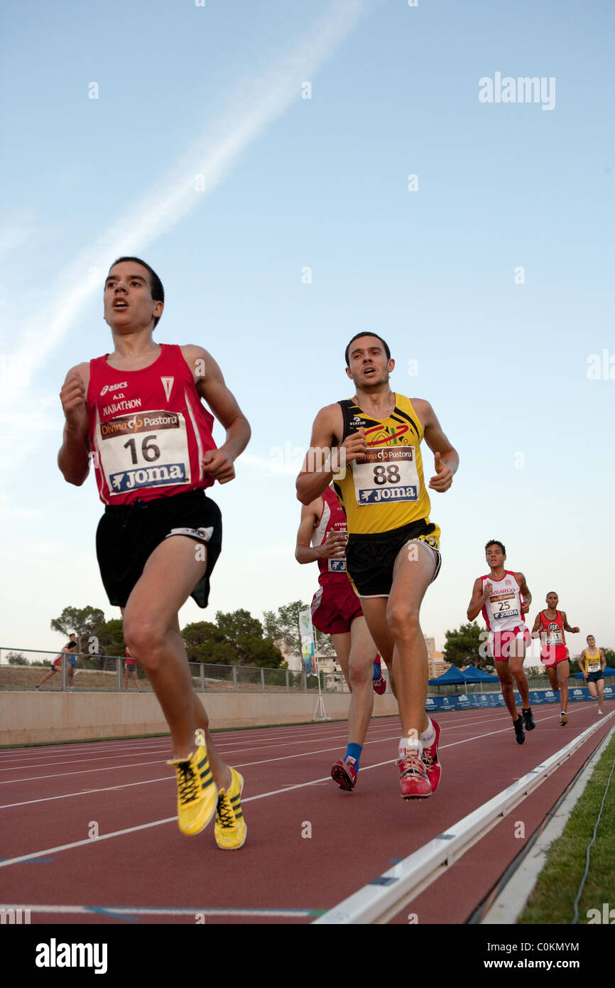 adult athletes running.Sport outdoor Athletics competition race track ...
