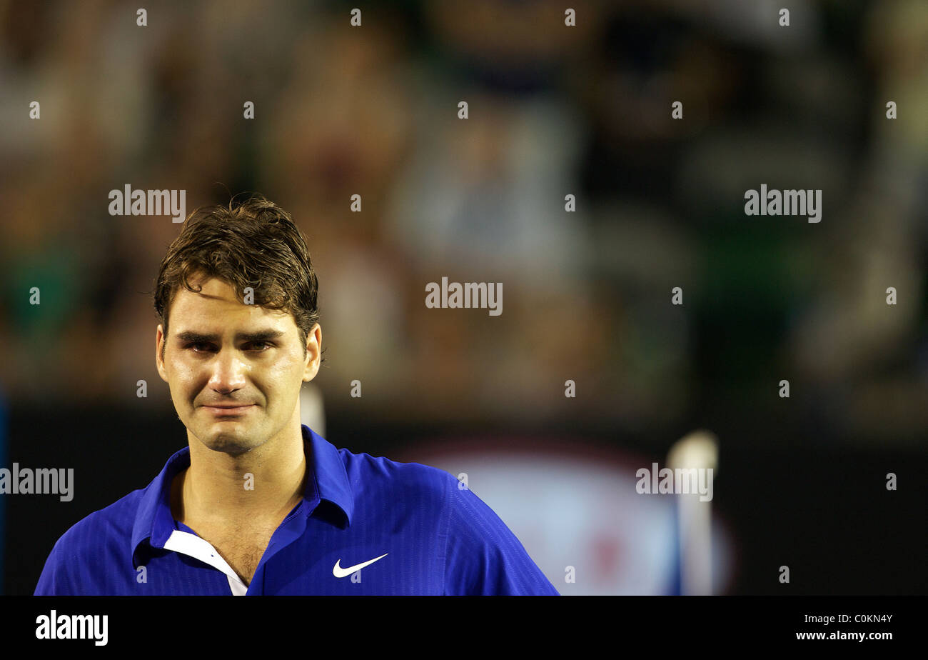 Roger Federer breaks down crying during the trophy presentation after he  was defeated by Rafael Nadal in the Men's Singles Final Stock Photo - Alamy