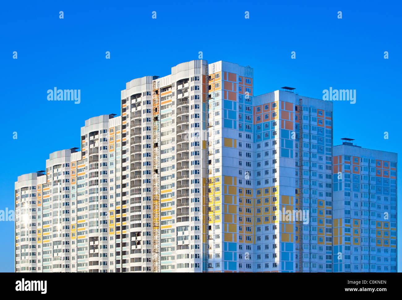 New apartment building on sky background Stock Photo - Alamy
