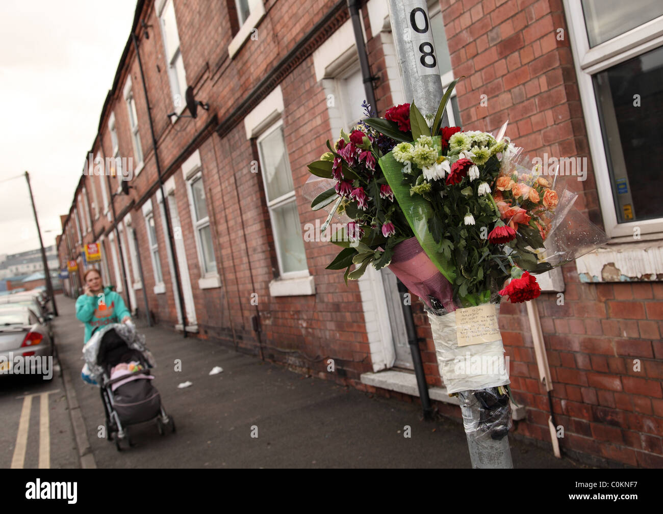 Floral tributes in memory of a gun crime victim murdered in the St Ann's area of Nottingham, England, U.K. Stock Photo