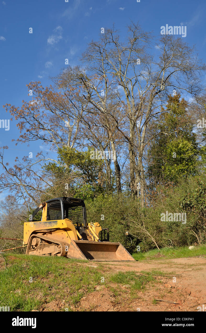 A construction bulldozer in a field. Stock Photo