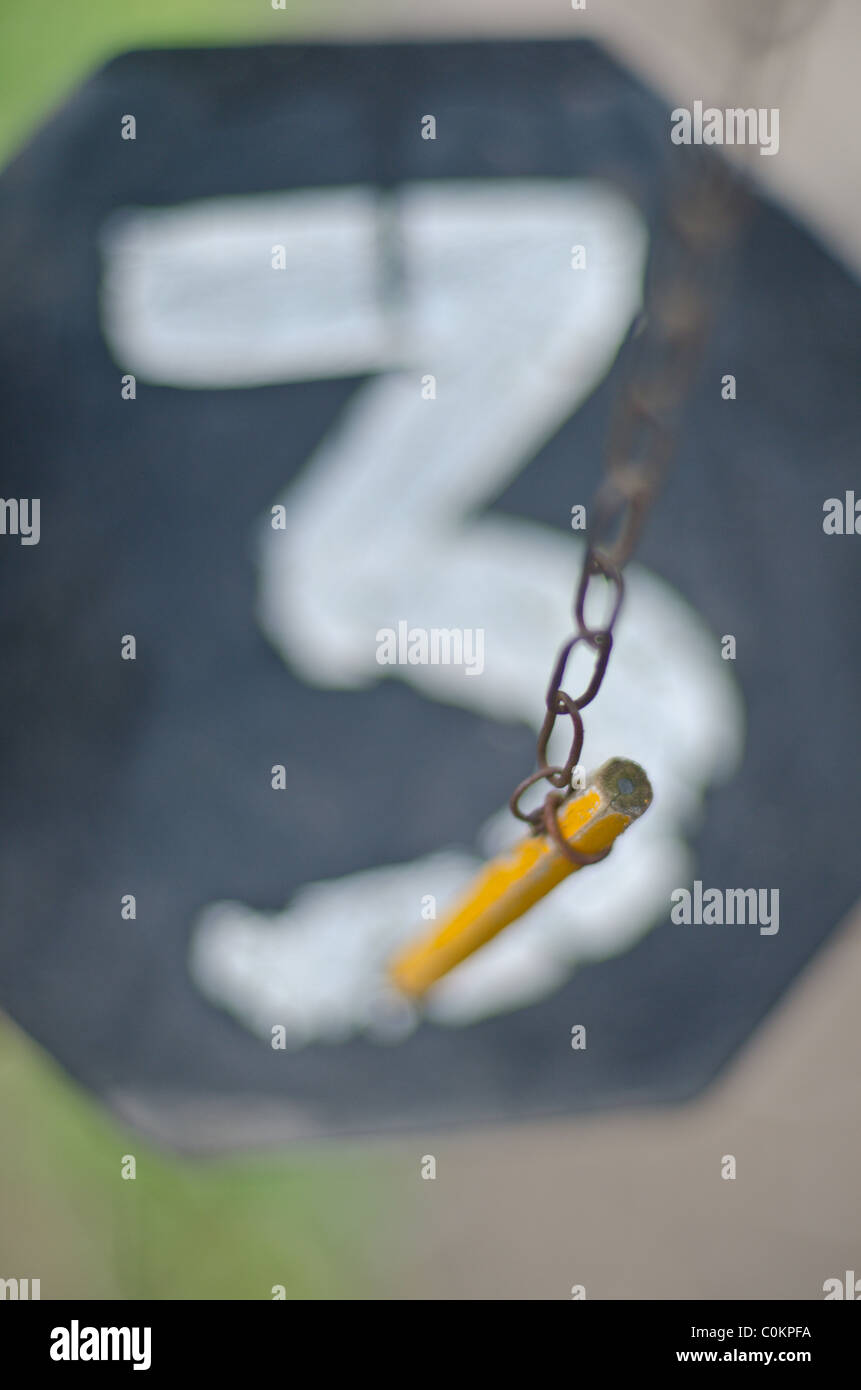 pencil on chain Stock Photo Alamy