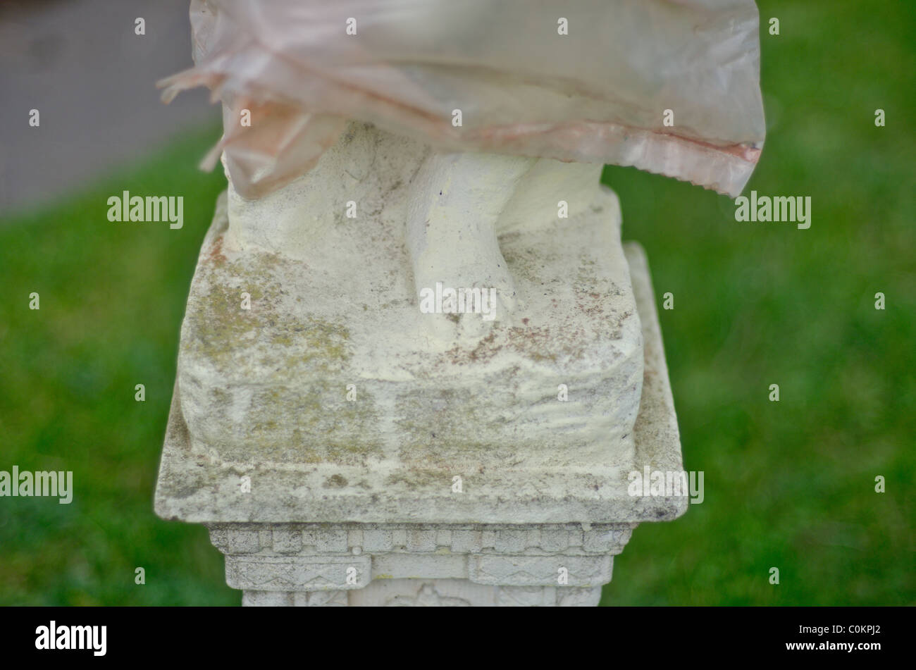 feet of alabaster statue wrapped in plastic Stock Photo Alamy