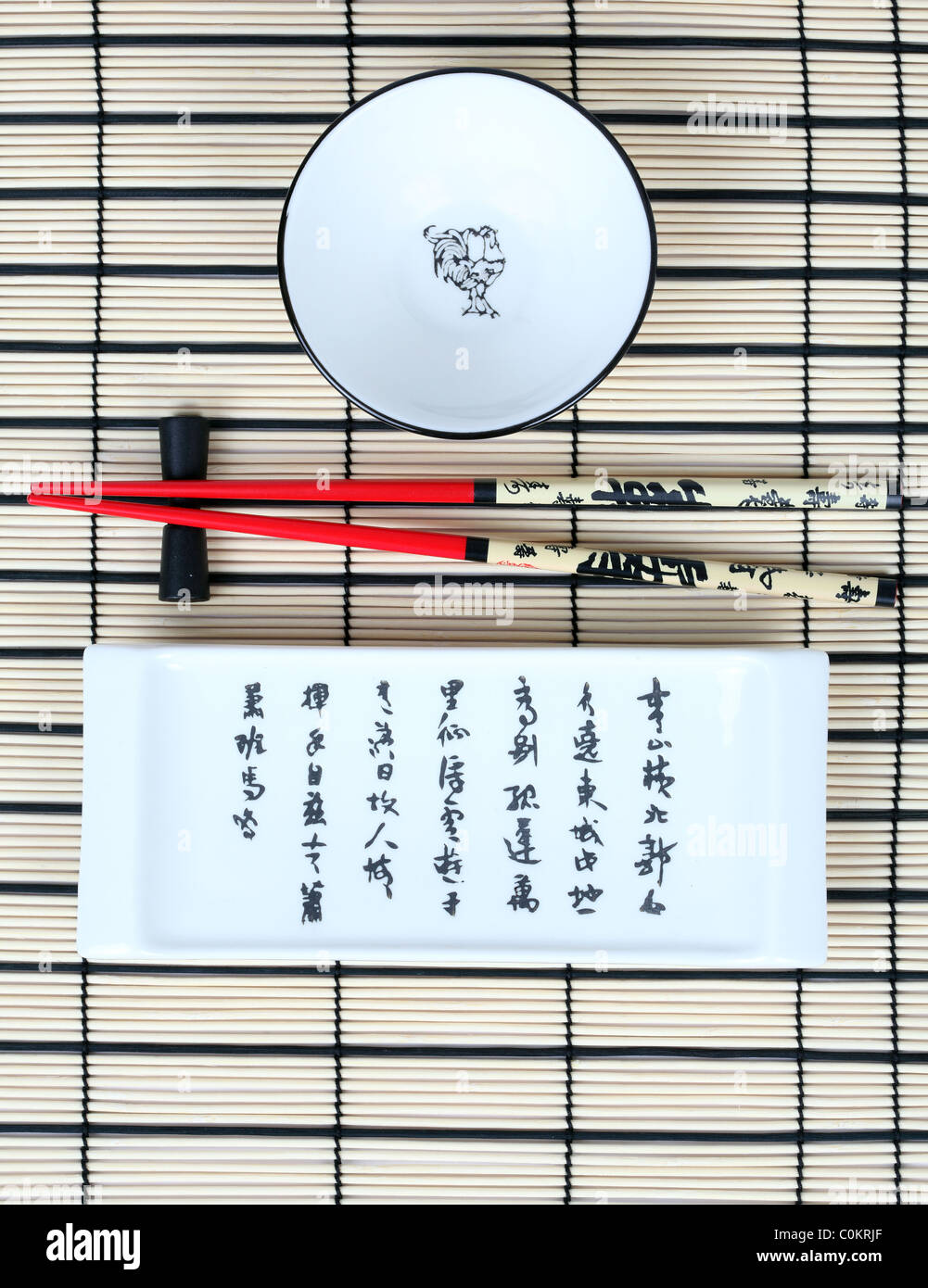 Place setting for asian food with bowl and chopsticks Stock Photo Alamy