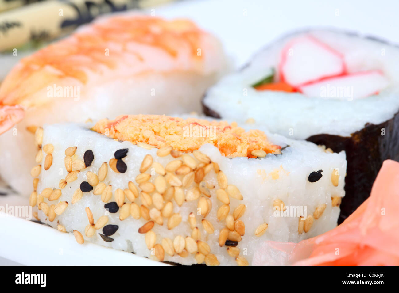 Mixed sushi on a plate with pickled ginger Stock Photo