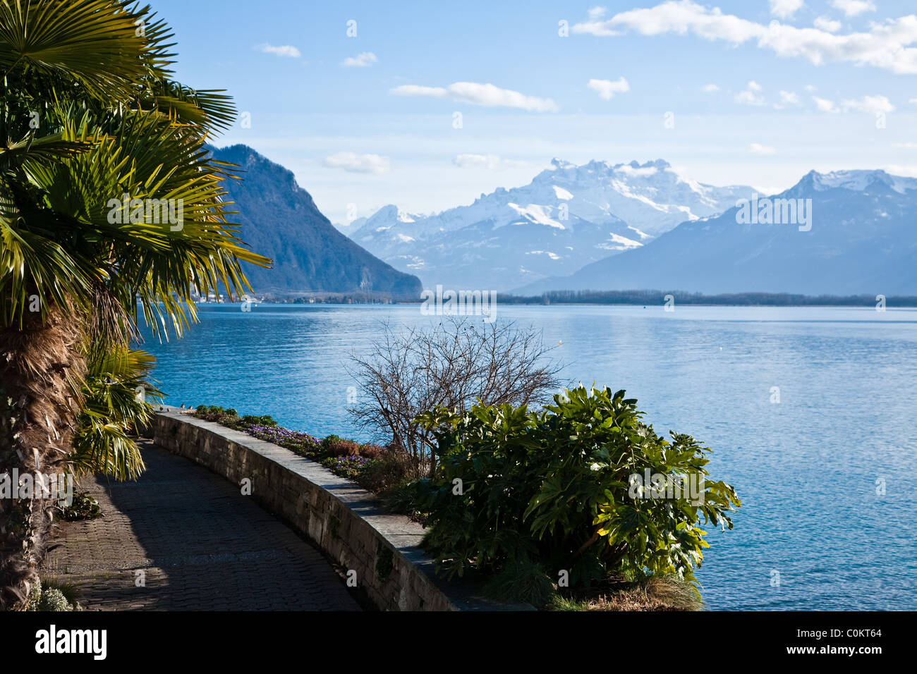 A view of the Swiss Alps across Lake Geneva from Montreux, Switzerland Stock Photo