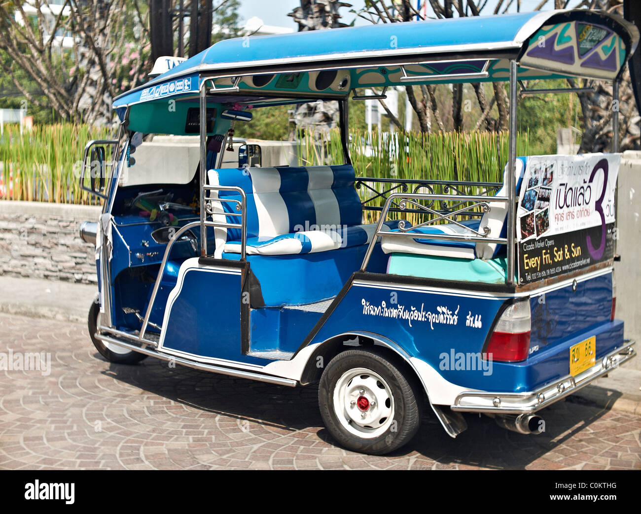 Tuk Tuk, traditional Thai three wheeled taxi transportation. Thailand S