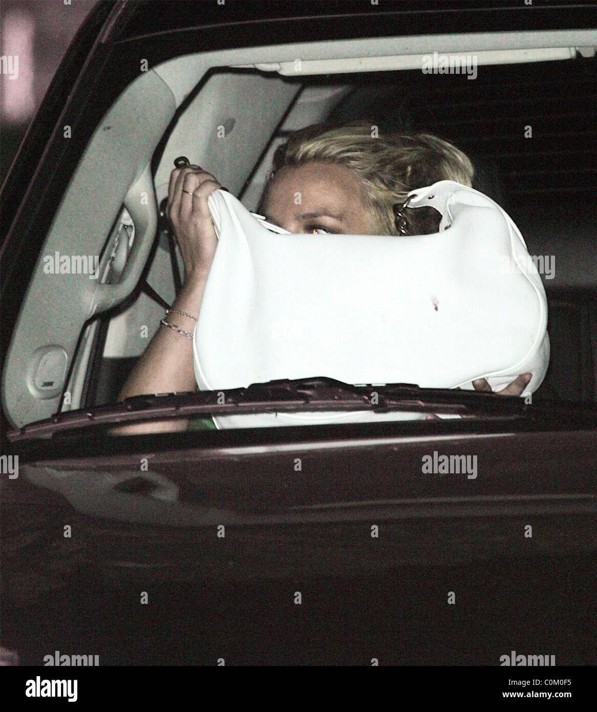 Britney Spears Arriving at Conaway recording studios with her mother Lynn. A camera-shy Britney did her best to hide from the Stock Photo