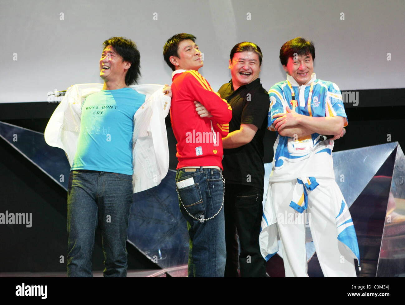 Emil Chau, Andy Liu,Liu Huan and Jackie Chan in press conference for new their song 'Hard to say goodbye'  Beijing, China - Stock Photo