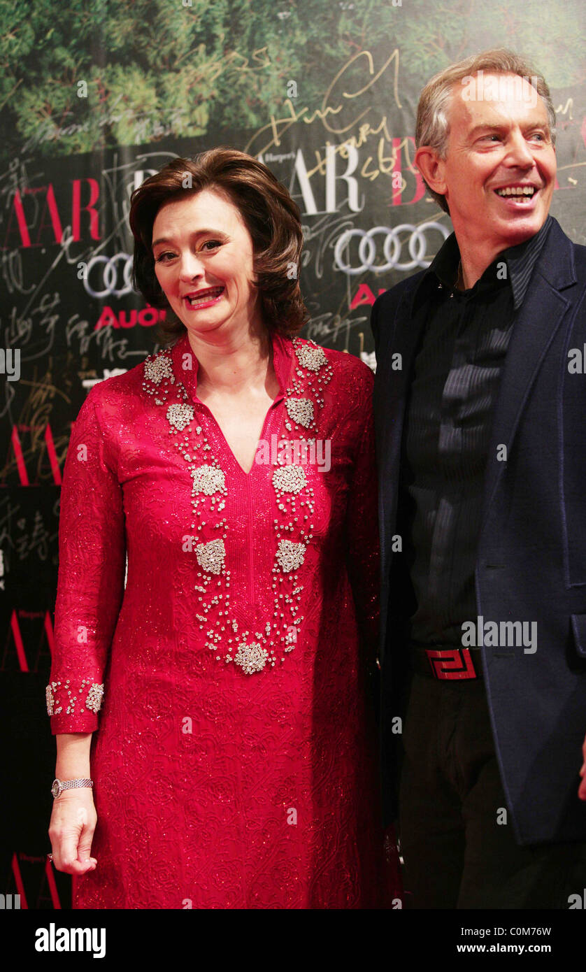 Former UK Prime Minister Tony Blair and his wife Cherie Blair arrive at
