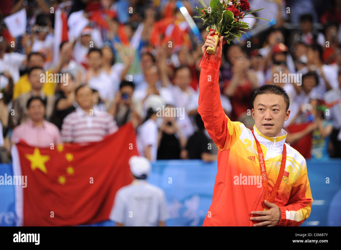 Gold medalist Ma Lin celebrates. China made a clean sweep of medals in the Men's Singles Table Tennis competition at the Peking Stock Photo