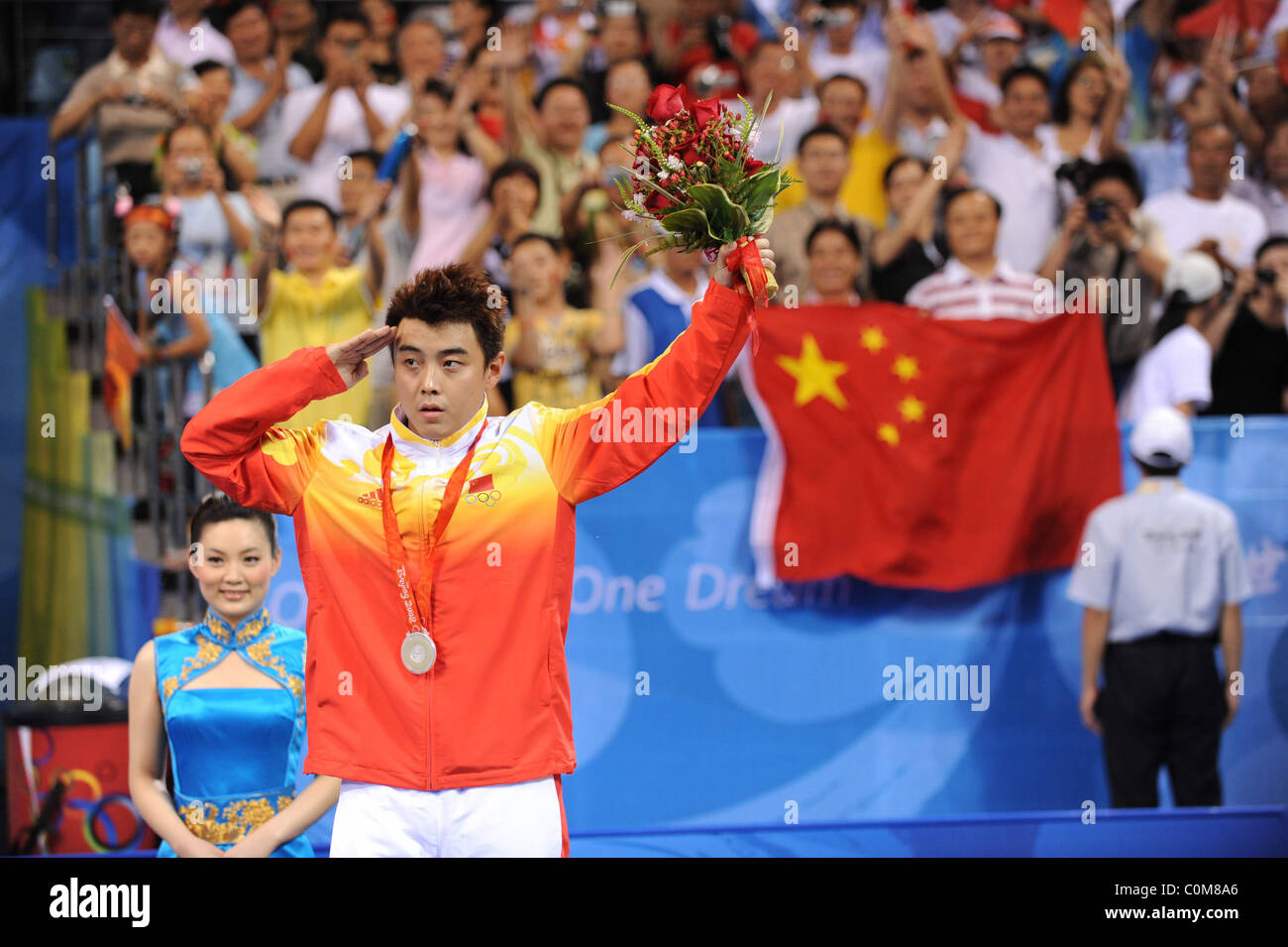 Wang Hao celebrates. China made a clean sweep of medals in the Men's Singles Table Tennis competition at the Peking University Stock Photo