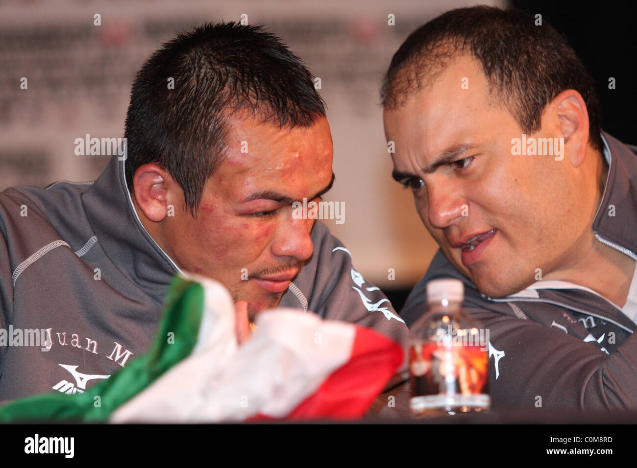 Juan Manuel Marquez (l) attends the post fight press conference after beating Joel Casamayor to win the Ring Magazine Stock Photo