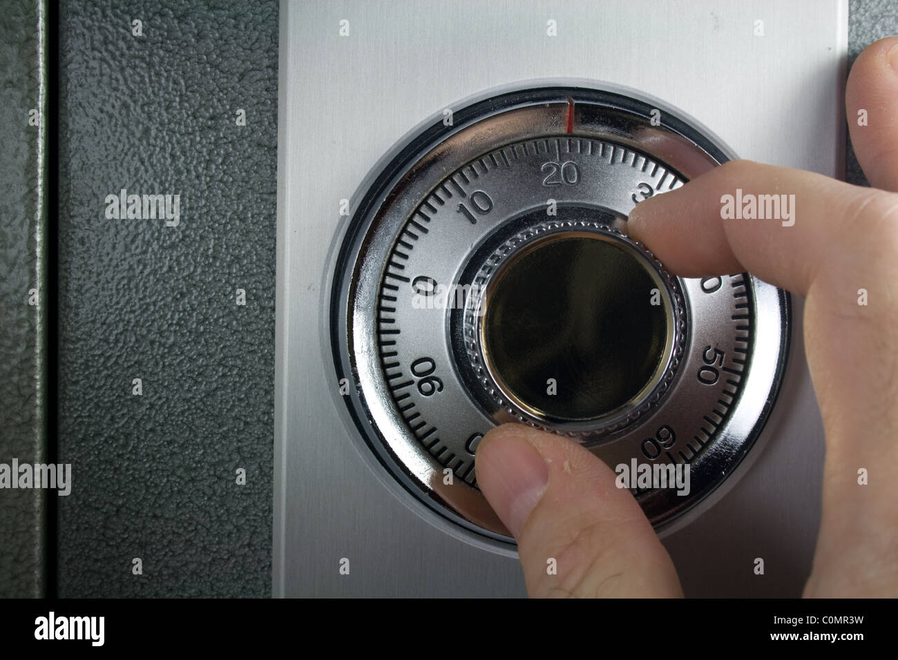 Hand Turning Combination Lock on Safe Stock Photo