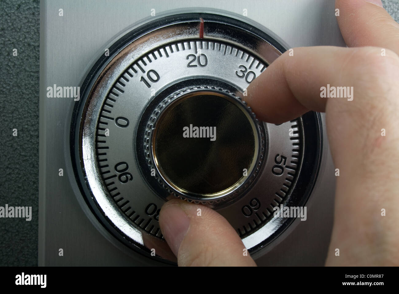 Hand Turning Combination Lock on Safe Stock Photo