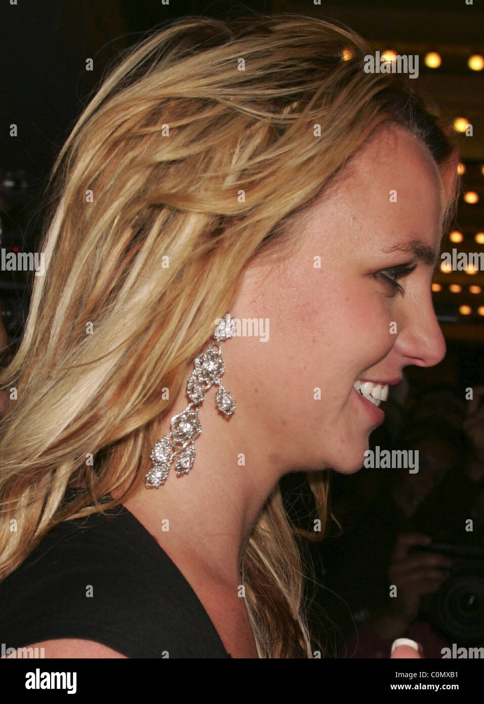 Britney Spears wearing huge diamond earrings showing a bad