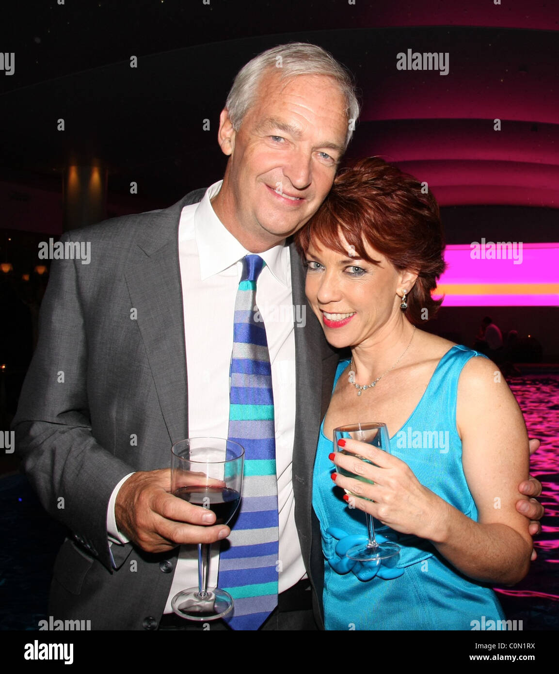 Jon Snow and Kathy Lette attend the Kathy Lette Book Launch 'To Love Honour and Betray' held at the Haymarket Hotel. London, Stock Photo