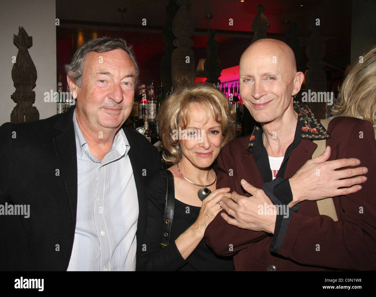 Nick Mason, Claire Frances and Richard O'Brien attends the Kathy Lette Book Launch 'To Love Honour and Betray' held at the Stock Photo