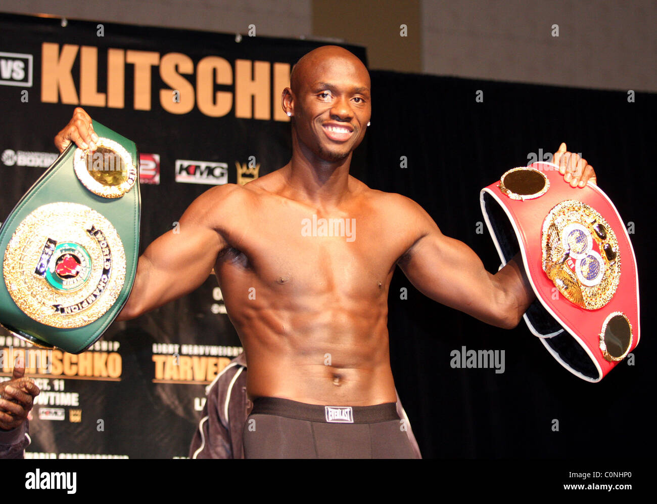 Antonio Tarver holds up his Championship IBF and IBO belts during a weigh  in before his Light Heavyweight Championship fight Stock Photo - Alamy