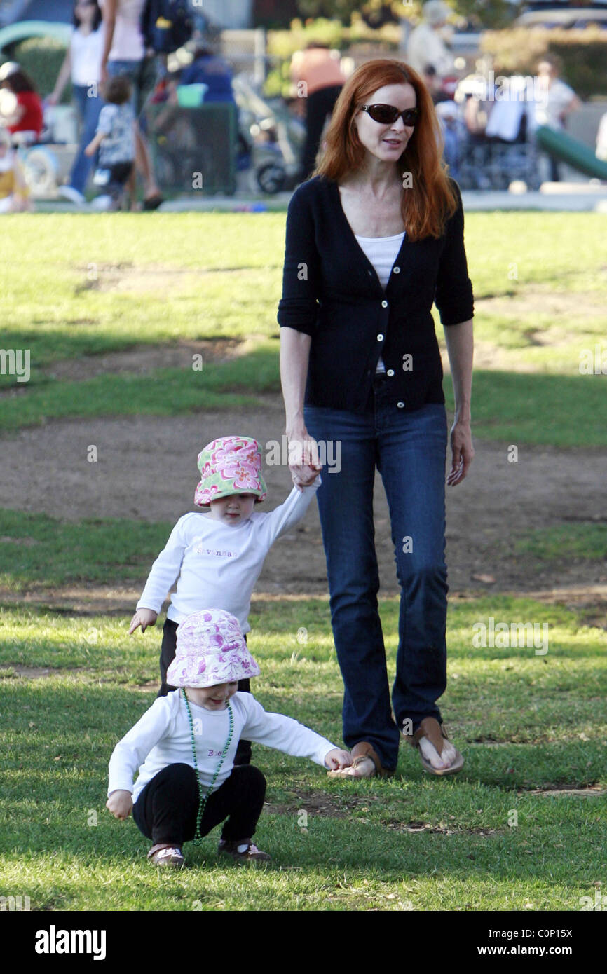 Marcia Cross takes her daughters Savannah and Eden to her local park