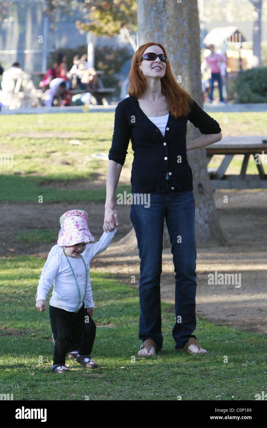 Marcia Cross takes her daughters Savannah and Eden to her local park