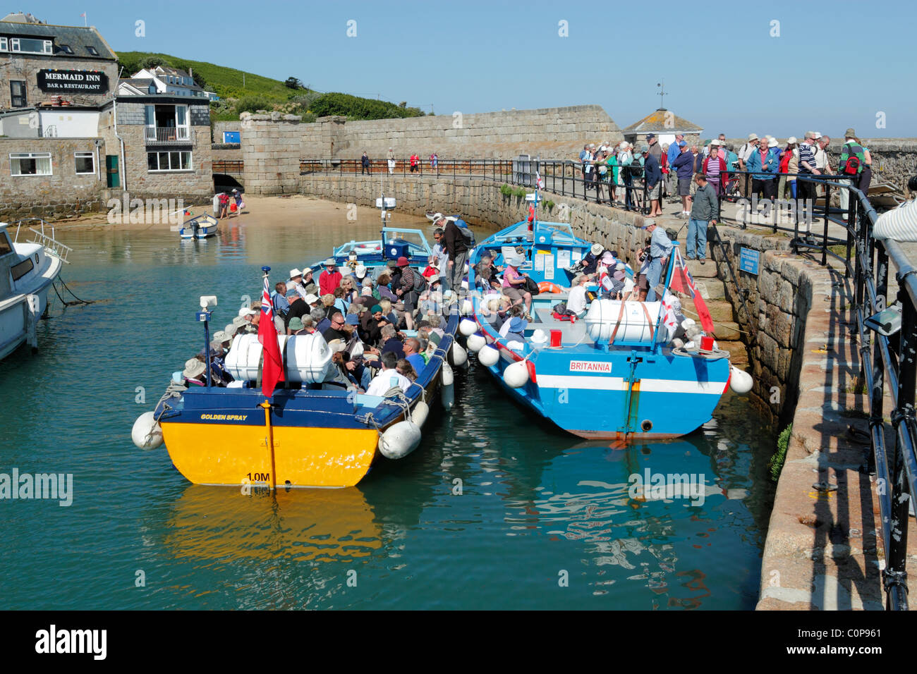 The Golden Spray and Britannia boats filling up with tourists, St. Mary