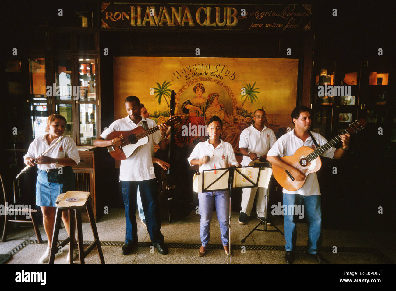 Havana. Cuba. A salsa band performing at the Fundacion Havana Club bar. (Museo del Ron) Stock Photo
