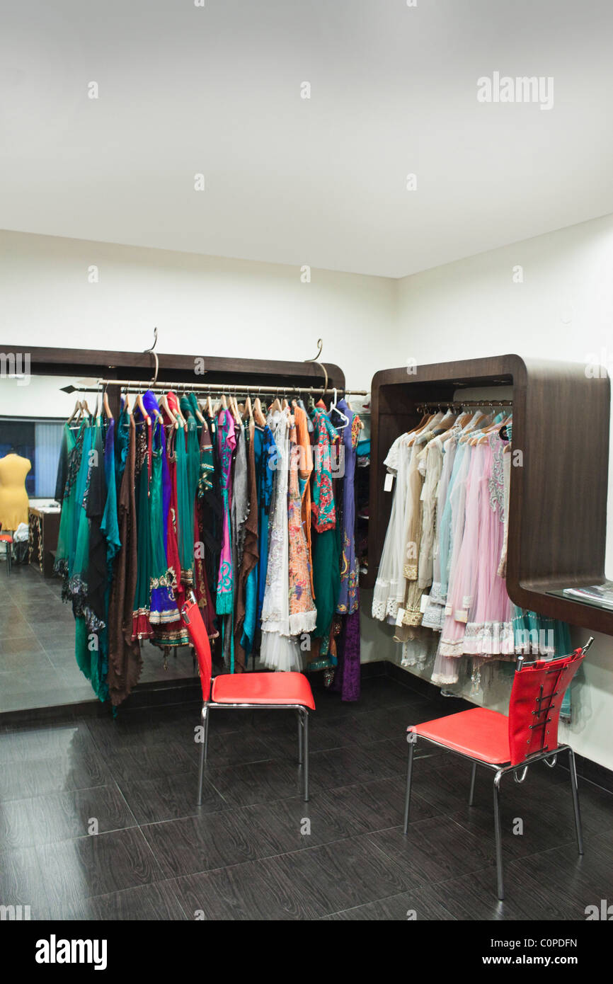 Clothes hanging in a clothing store, Ansal Plaza, New Delhi, India Stock Photo