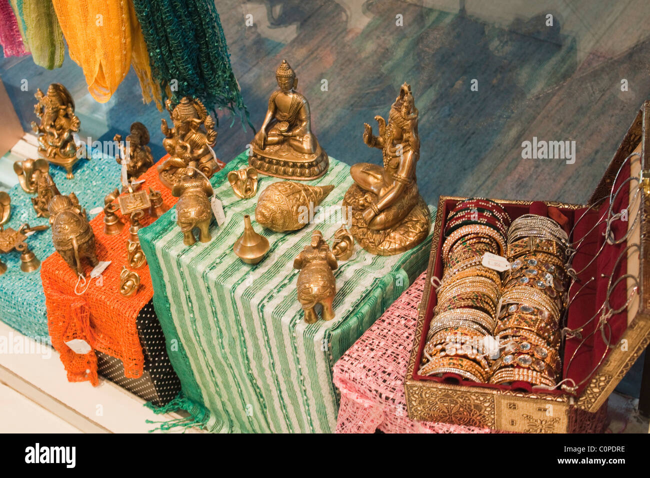 Idols with a jewelry box at a market stall, New Delhi, India Stock Photo