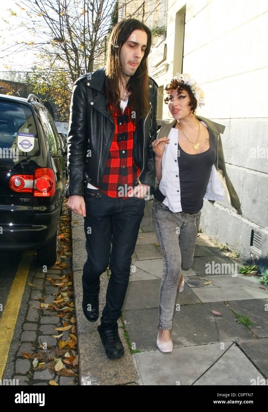 Blake Wood and Amy Winehouse looking happy as she goes for a drink in a  local pub with friends. London, England - 11.11.08 A Stock Photo - Alamy