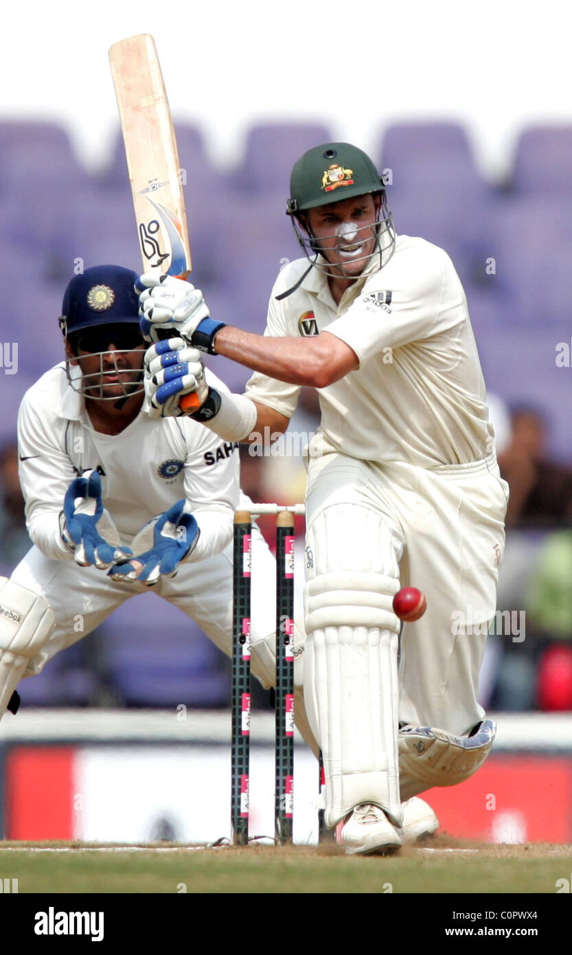 Michael Hussey plays a shot India defeat Australia by 172 runs in the final Test in Nagpur to seal a 2-0 series victory and win Stock Photo
