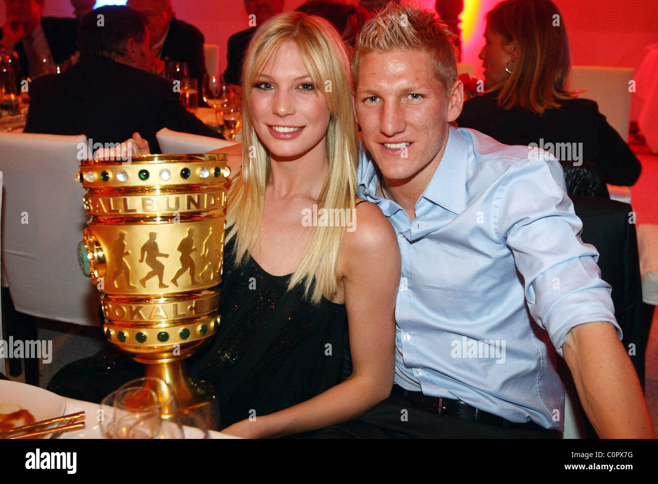 Bastian Schweinsteiger (Bayern M³nchen) and girlfriend Freundin Sarah Brandner. at a celebrity Poker tournamant Berlin, Germany Stock Photo