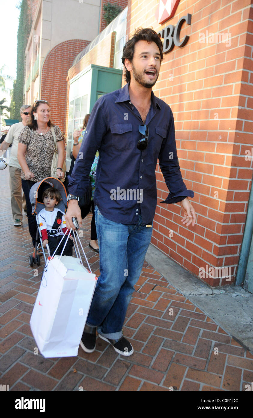Rodrigo Santoro leaving a medical building in Beverly Hills carrying a