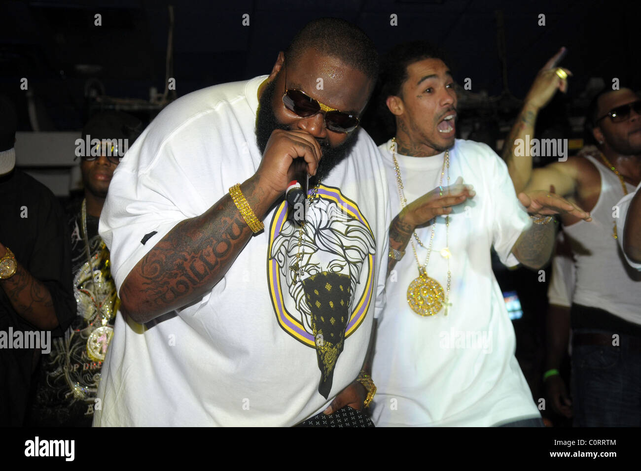 Rick Ross and Triple C performing at 'Power 96 Presents: The World's Largest Office Christmas Party' at Cafe Iguana Pines. Stock Photo